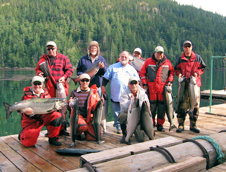 Salmon fishermen display their catch